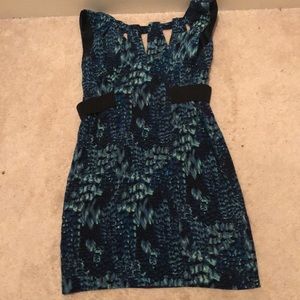 Nanette Lepore shift dress. Cut-outs on top and black elastic side ribbons.